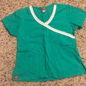 Cute green scrub top. Size S great condition.